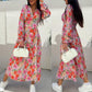 Modisches, langärmeliges, taillenbetontes Blumenkleid mit V-Ausschnitt und Knopfleiste