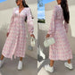 Modisches, langärmeliges, taillenbetontes Blumenkleid mit V-Ausschnitt und Knopfleiste