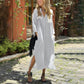 Langes Damen-Freizeitkleid mit V-Ausschnitt, Taschen und Schlitzsaum